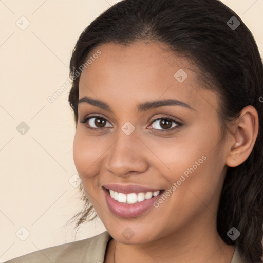 Joyful white young-adult female with long  brown hair and brown eyes