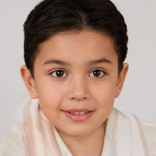 Joyful white child female with short  brown hair and brown eyes