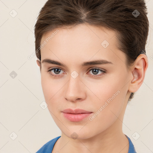 Neutral white young-adult female with medium  brown hair and brown eyes