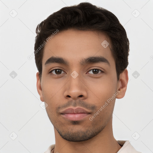 Neutral latino young-adult male with short  black hair and brown eyes