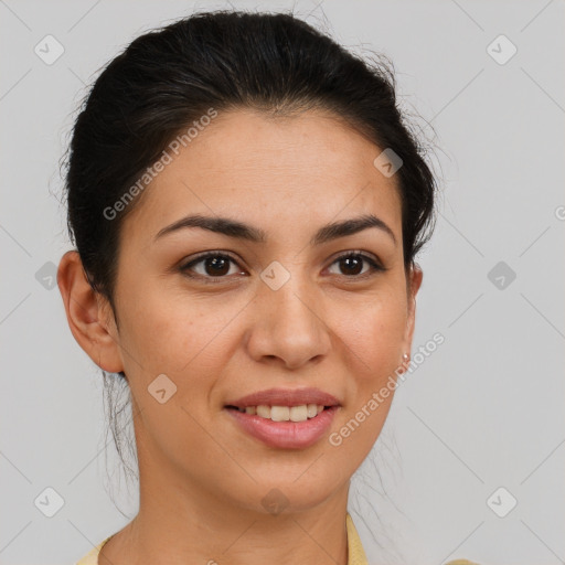 Joyful latino young-adult female with short  brown hair and brown eyes