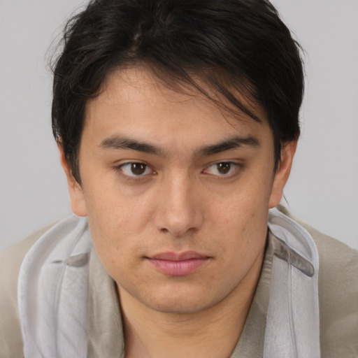 Neutral asian young-adult male with short  brown hair and brown eyes