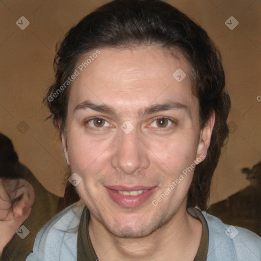 Joyful white adult male with medium  brown hair and brown eyes