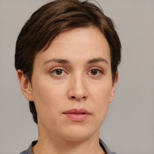 Neutral white young-adult female with short  brown hair and brown eyes