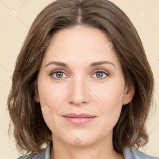 Joyful white young-adult female with medium  brown hair and green eyes