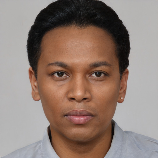 Neutral black young-adult female with short  black hair and brown eyes