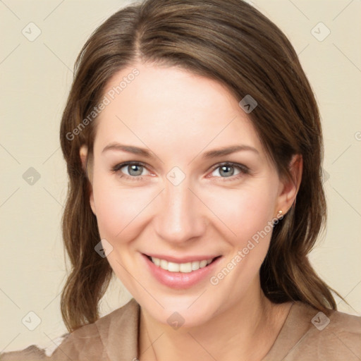 Joyful white young-adult female with medium  brown hair and green eyes