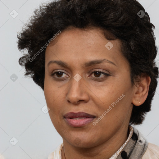 Joyful white adult female with short  brown hair and brown eyes