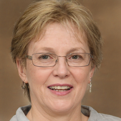 Joyful white middle-aged female with medium  brown hair and blue eyes