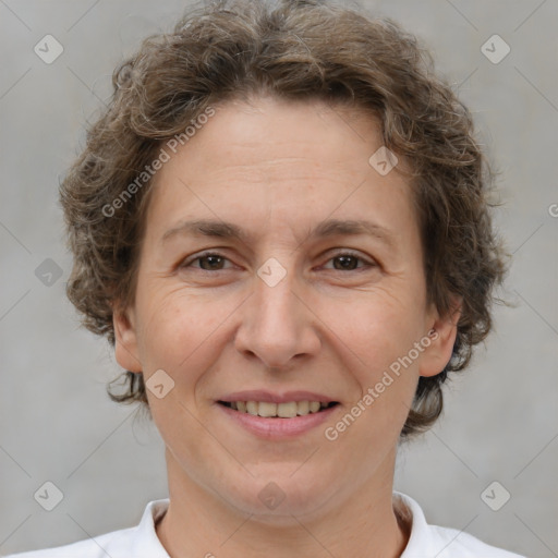 Joyful white adult female with short  brown hair and brown eyes