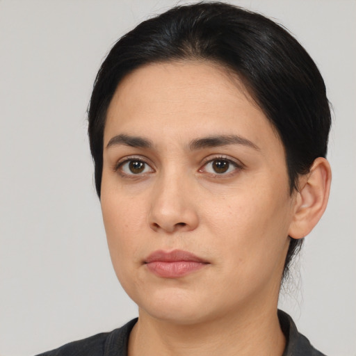 Neutral asian young-adult female with medium  black hair and brown eyes