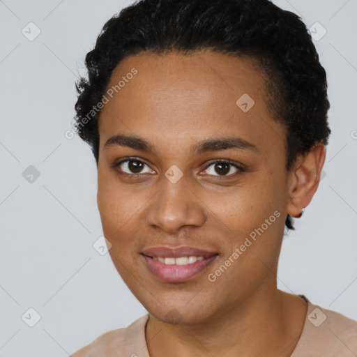 Joyful black young-adult female with short  brown hair and brown eyes