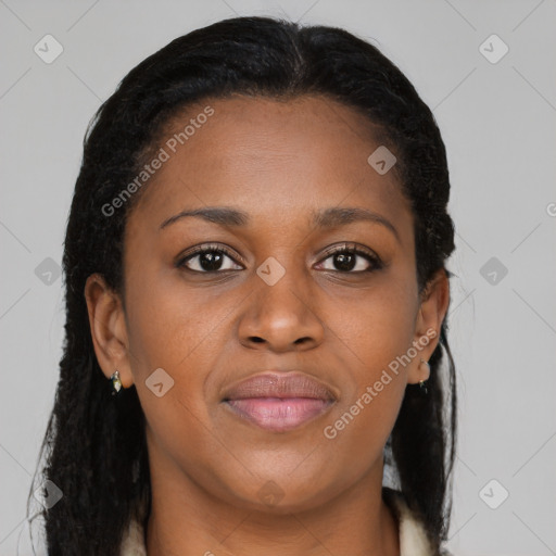 Joyful black young-adult female with long  brown hair and brown eyes