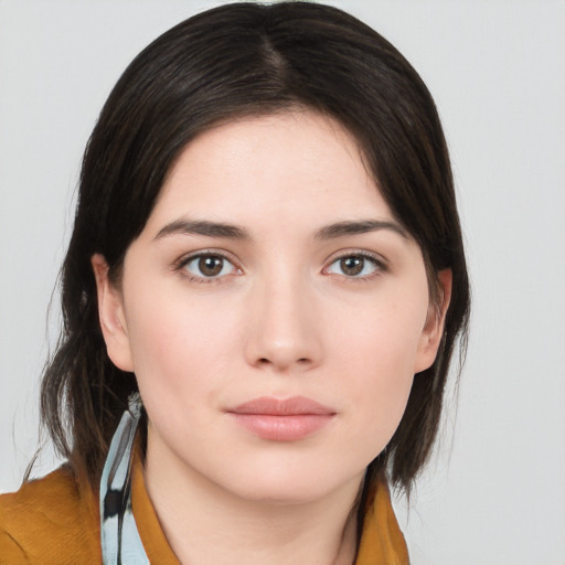 Neutral white young-adult female with medium  brown hair and brown eyes