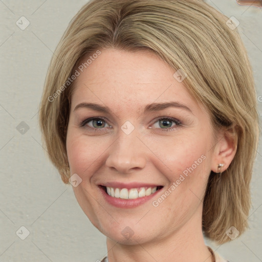 Joyful white young-adult female with medium  brown hair and green eyes