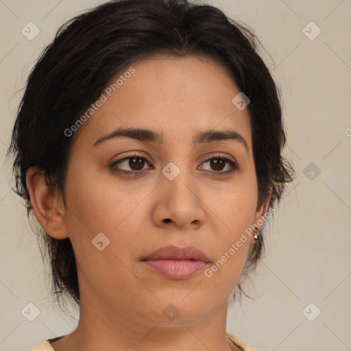 Joyful latino young-adult female with medium  brown hair and brown eyes