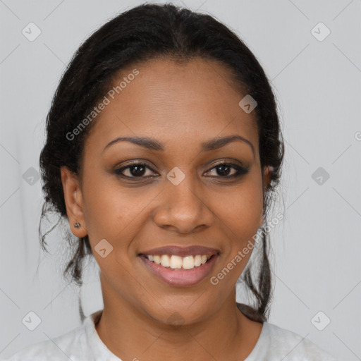 Joyful black young-adult female with medium  brown hair and brown eyes