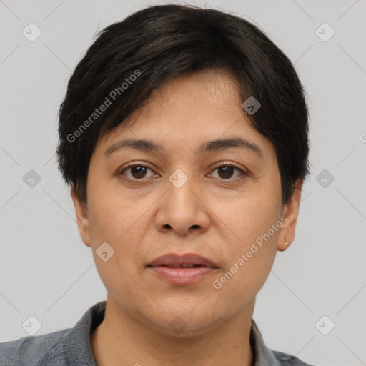 Joyful white adult female with short  brown hair and brown eyes