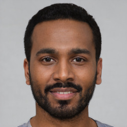 Neutral black young-adult male with short  black hair and brown eyes