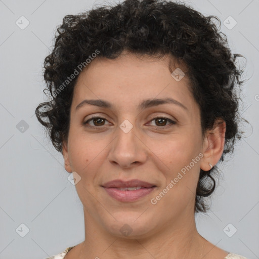 Joyful white adult female with short  brown hair and brown eyes