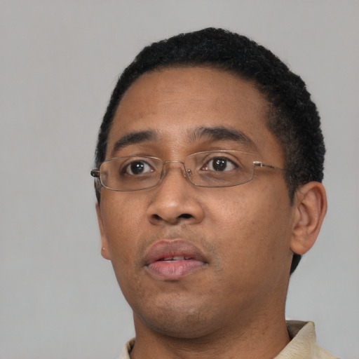 Neutral black young-adult male with short  black hair and brown eyes