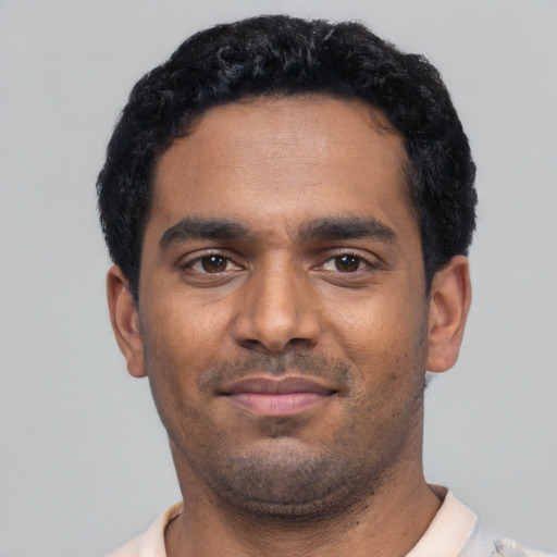Neutral black young-adult male with short  black hair and brown eyes