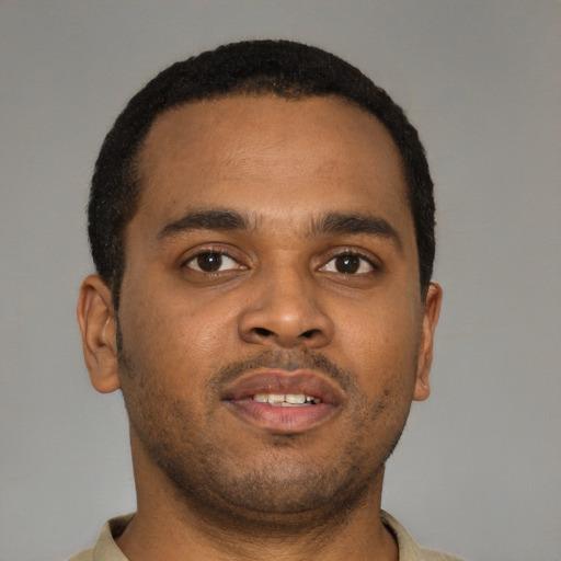 Neutral latino young-adult male with short  brown hair and brown eyes