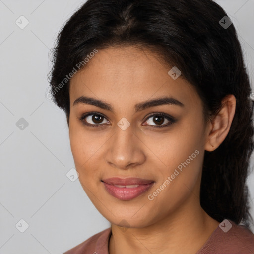 Joyful latino young-adult female with long  brown hair and brown eyes