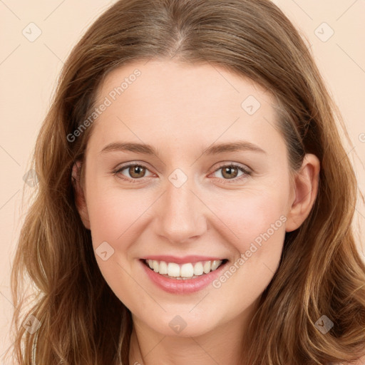 Joyful white young-adult female with long  brown hair and green eyes