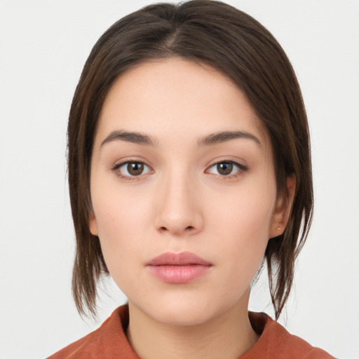 Neutral white young-adult female with medium  brown hair and brown eyes