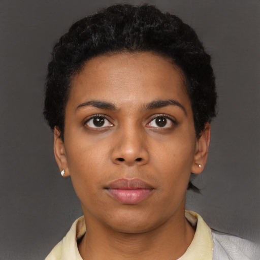 Neutral black young-adult female with short  black hair and brown eyes