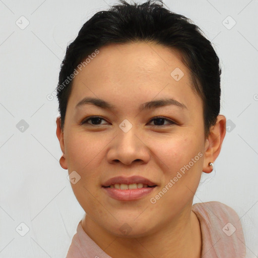 Joyful asian young-adult female with short  brown hair and brown eyes