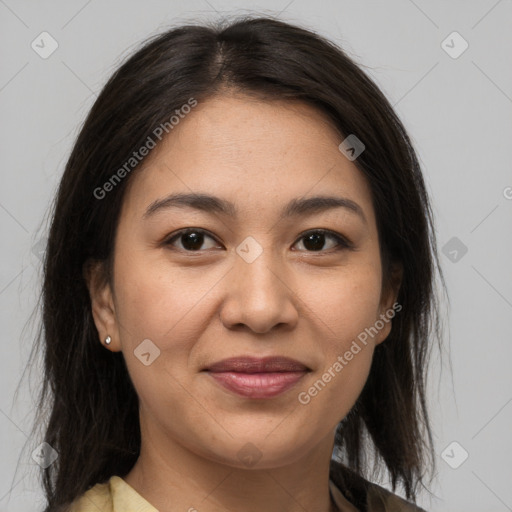 Joyful latino young-adult female with medium  brown hair and brown eyes