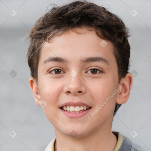 Joyful white child male with short  brown hair and brown eyes