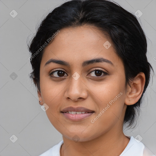 Joyful latino young-adult female with medium  black hair and brown eyes