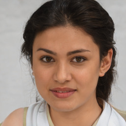 Joyful white young-adult female with medium  brown hair and brown eyes