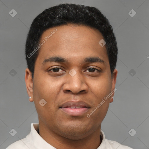 Joyful latino young-adult male with short  black hair and brown eyes