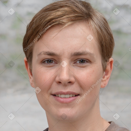 Joyful white young-adult female with short  brown hair and grey eyes