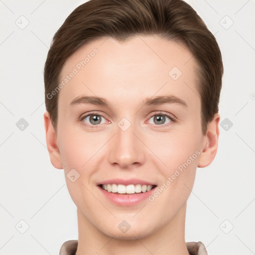 Joyful white young-adult female with short  brown hair and grey eyes