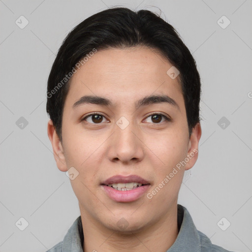 Joyful asian young-adult male with short  brown hair and brown eyes