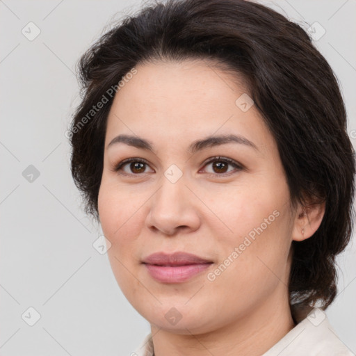 Joyful white adult female with medium  brown hair and brown eyes