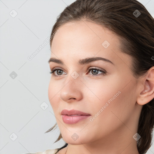 Neutral white young-adult female with medium  brown hair and brown eyes