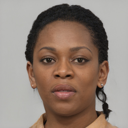 Neutral black young-adult female with short  brown hair and brown eyes