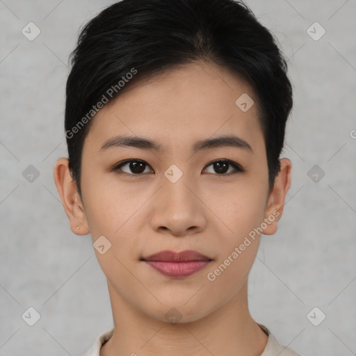 Joyful asian young-adult female with short  black hair and brown eyes