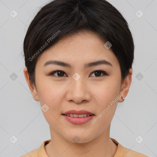 Joyful asian young-adult female with short  brown hair and brown eyes