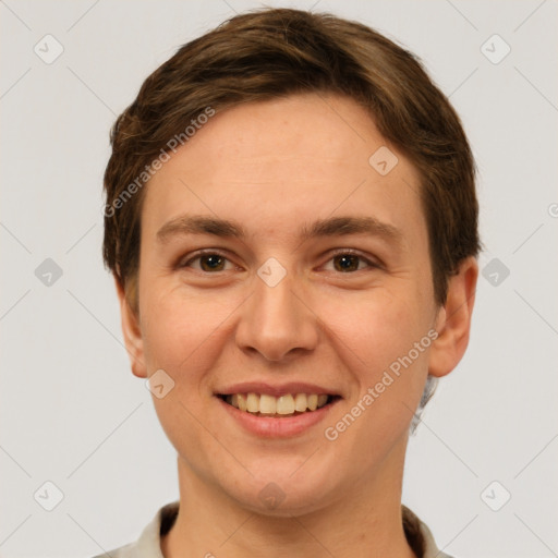 Joyful white young-adult female with short  brown hair and grey eyes