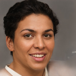 Joyful white adult female with short  brown hair and brown eyes