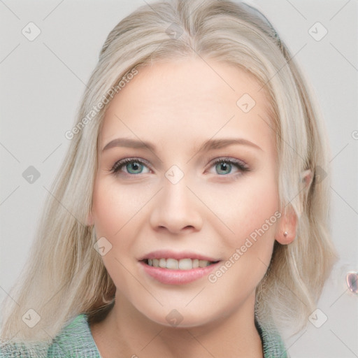 Joyful white young-adult female with medium  brown hair and blue eyes