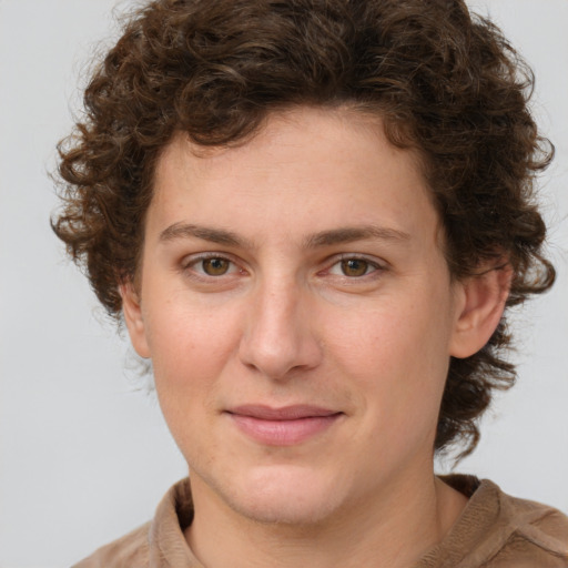 Joyful white young-adult female with medium  brown hair and green eyes