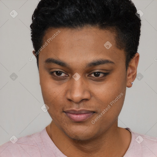 Joyful black young-adult male with short  black hair and brown eyes